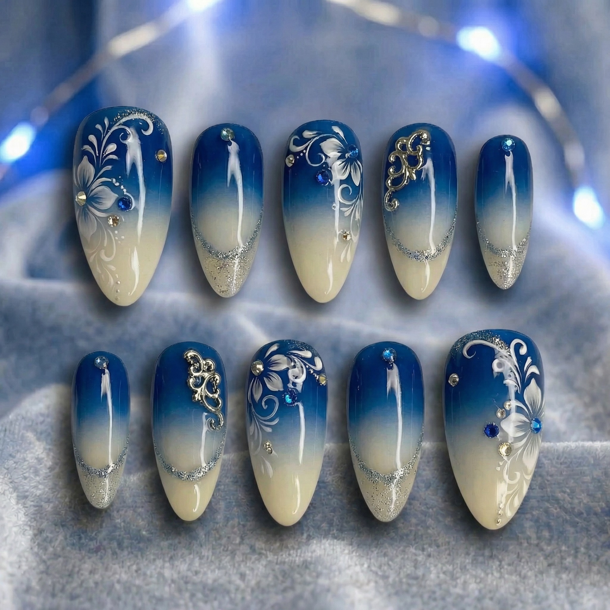 Blue gradient press-on nail flat lay upload