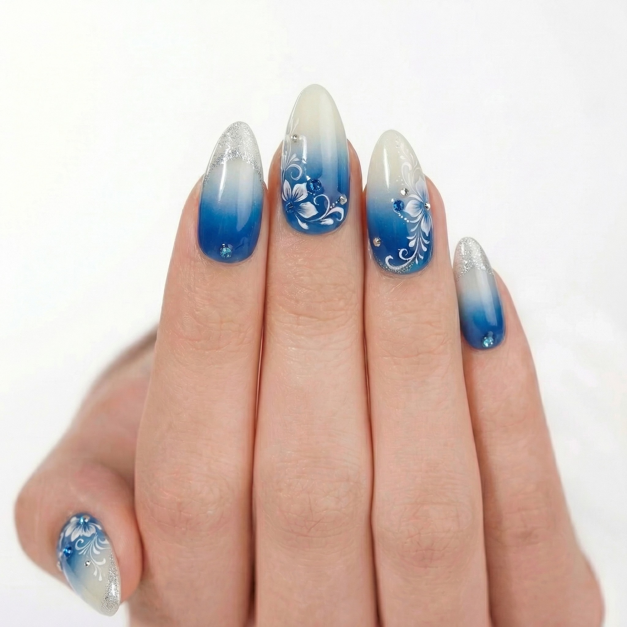 Blue gradient press-on nail product photo - consistent catalog pose