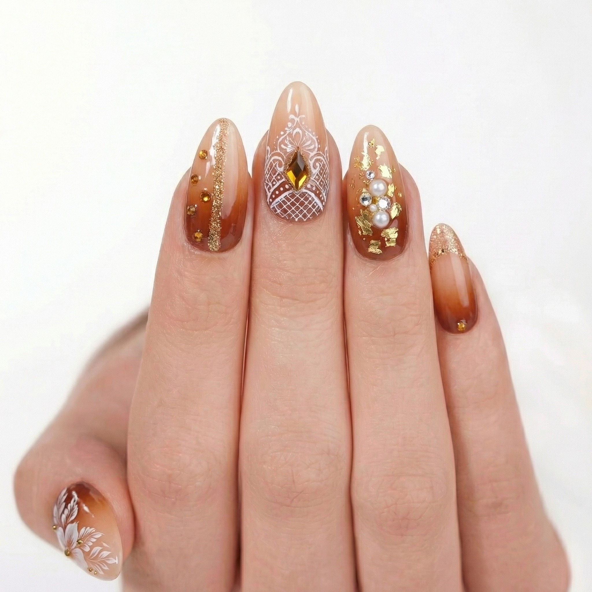 Brown henna-style press-on nail product photo - consistent catalog pose