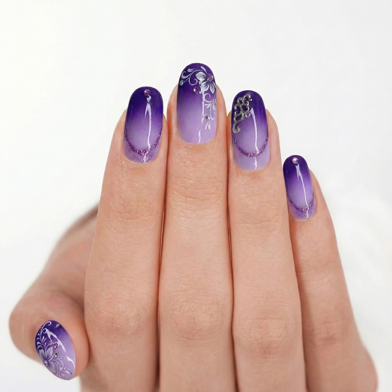 Purple gradient press-on nail product photo - consistent catalog pose