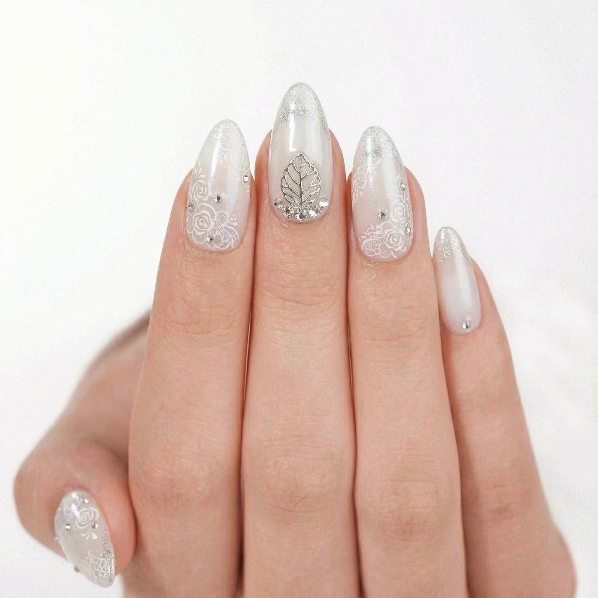 White bridal press-on nail product photo - consistent catalog pose