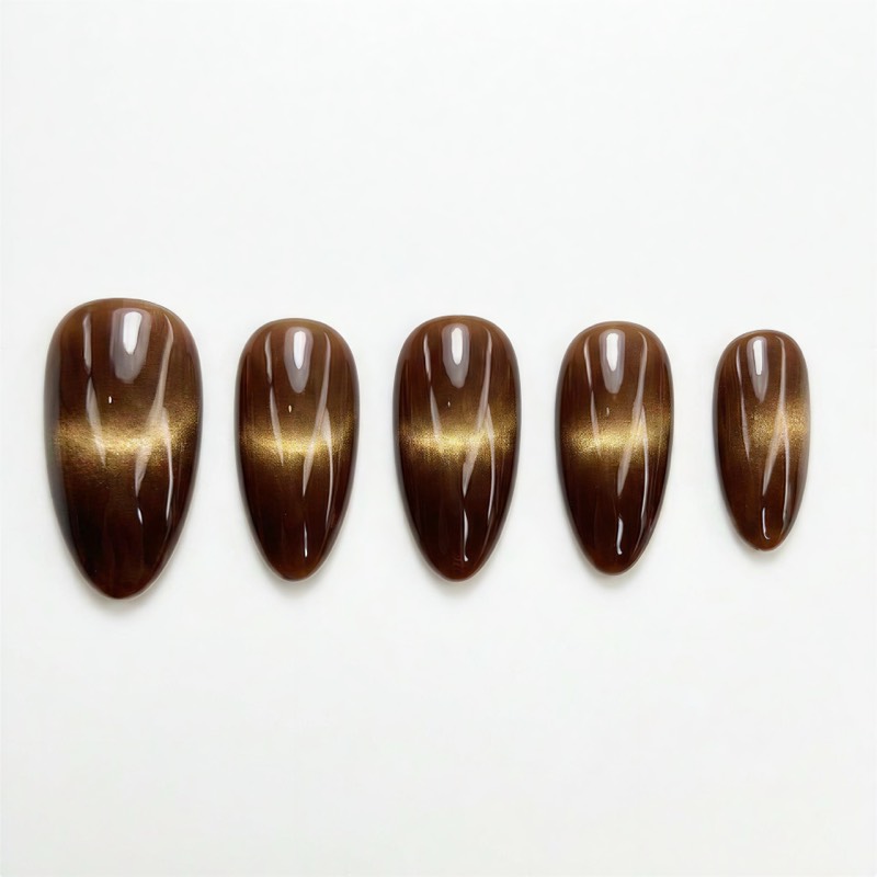 Press-on nail design uploaded to Try My Nails - brown cat-eye nails on white background