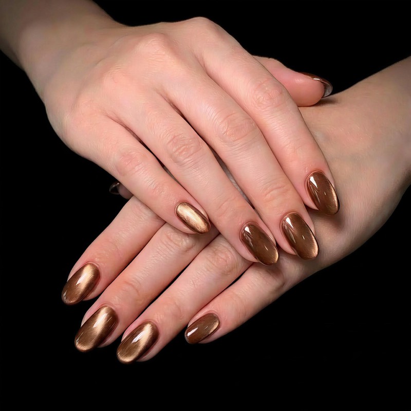 Press-on nail product photo - elegant pose on black background